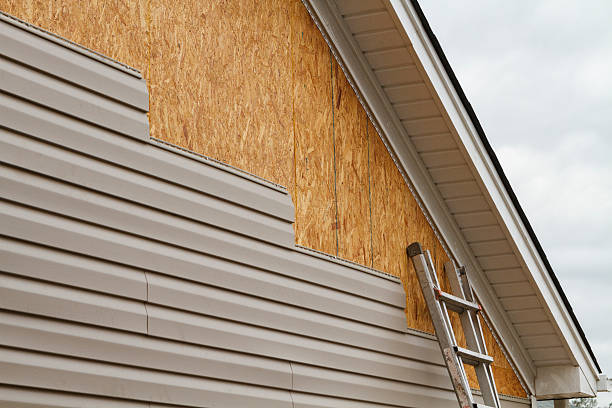 Professional Emergency Siding Repair technician working in Zoar, OH